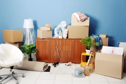 Apartment removals in Hackney showing stair access and packing