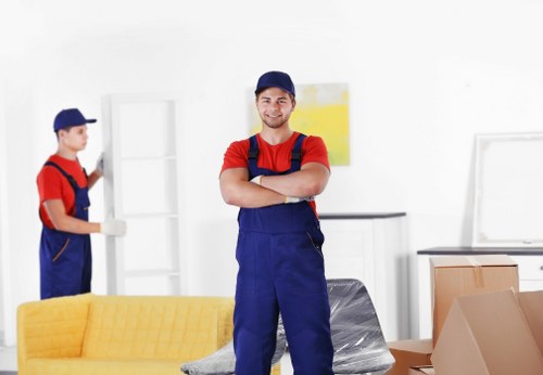 Removal team planning a house move in a Hackney residential street