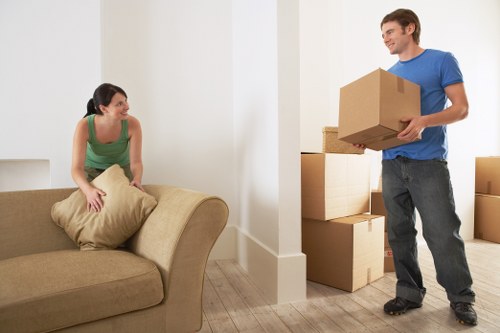 Packed office furniture and equipment ready for relocation in East London
